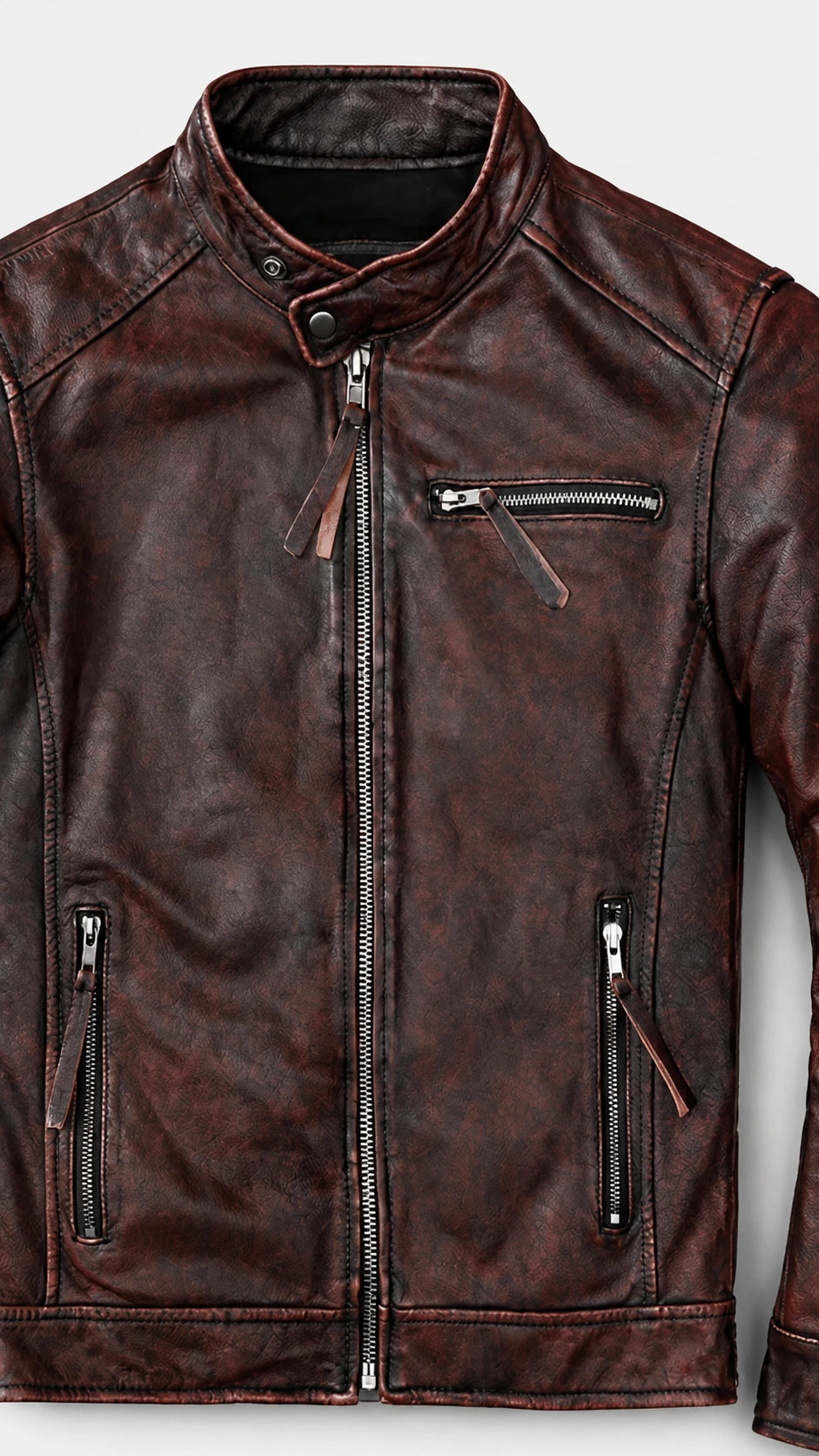 Angled view of the oxblood cafe racer showing the zip chest pockets