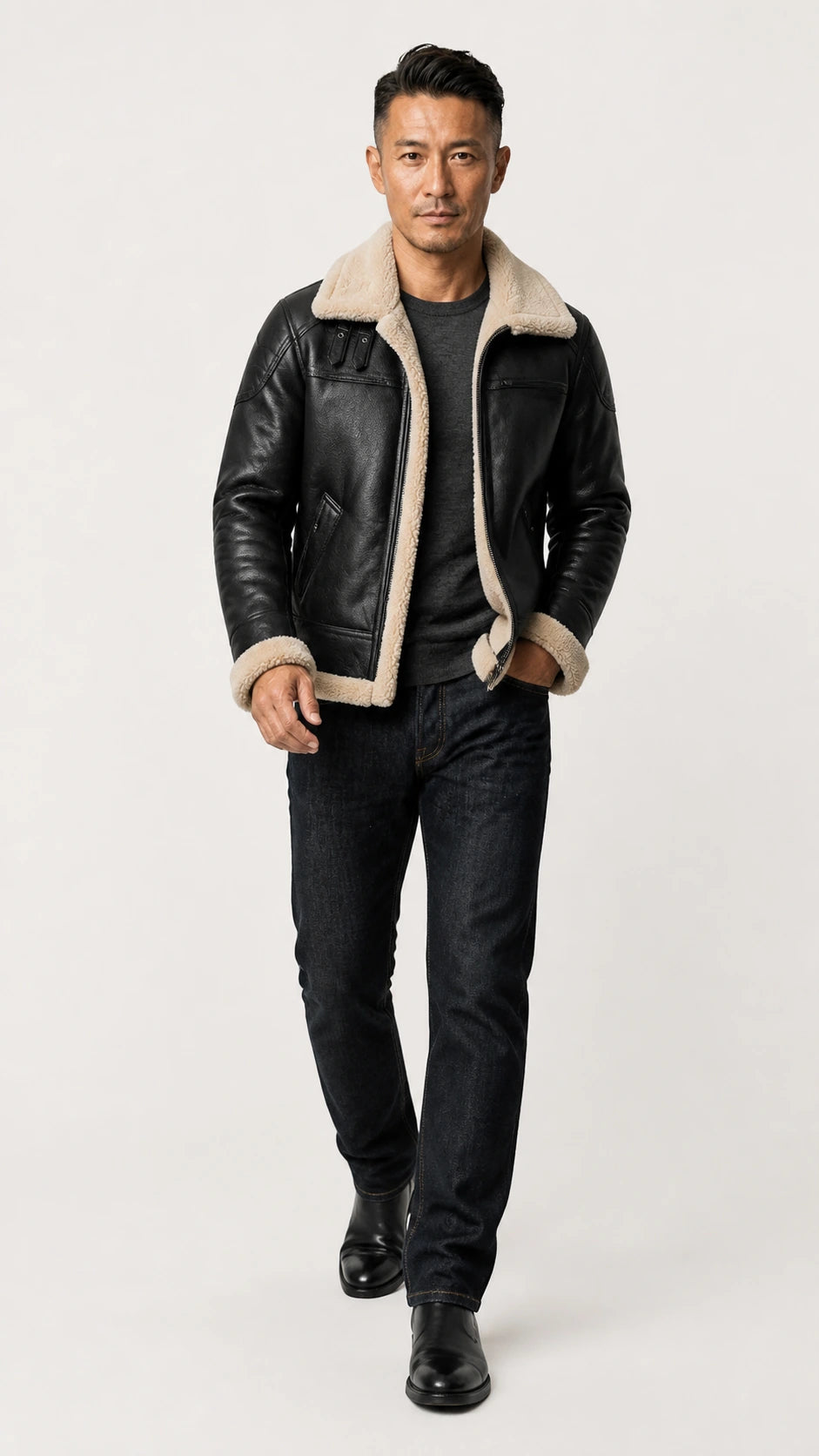 Full-length walking shot of the black shearling B-3 jacket